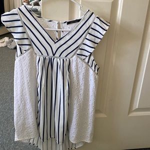 Very Pretty navy and white tank top with ruffled shoulder.